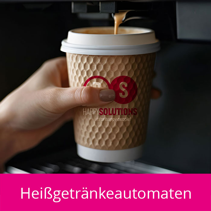 Frauenhand hält Kaffeebecher unter einen Kaffeeautomaten